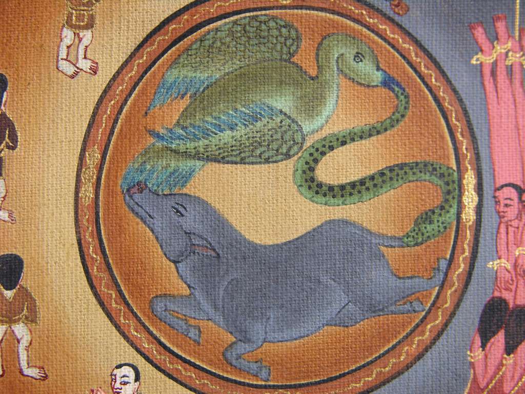 Tibetan Buddhism Wheel Of Life 04 Central Hub The central hub of the wheel identifies the root causes that create the basic problem of existence. They are depicted as a pig, a snake and a cock, each biting the tail of the one in front so that they create a circle. The pig represents ignorance, a misunderstanding of the notion of self or the ego. Ignorance leads to negative desires, represented by the cock, always feeding or in search of more food to peck at. When we cant get what we want, we experience frustration, irritation, anger and hatred, represented by the snake which is ready to strike out when threatened. Anger strengthens the ego sense and therefore we see the snake biting the tail of the pig and so the whole vicious circle is strengthened.